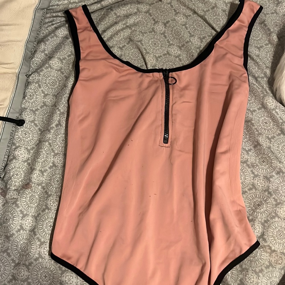 Pink body suit